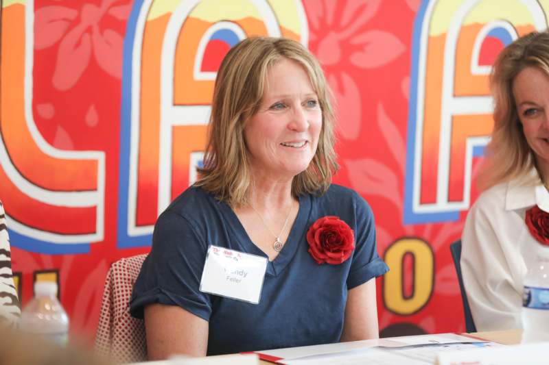 a woman sitting at a table