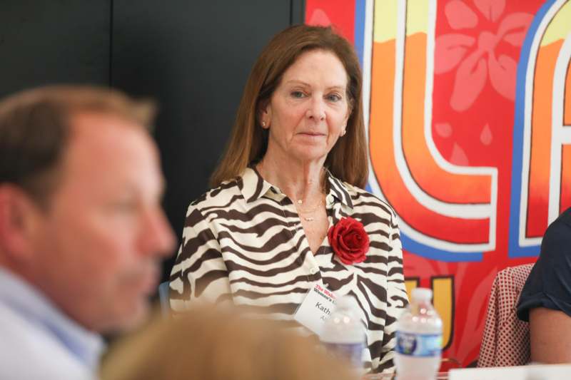 a woman sitting at a table
