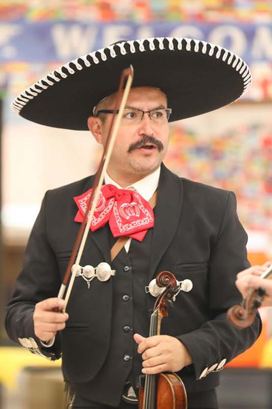 a man wearing a sombrero and a hat