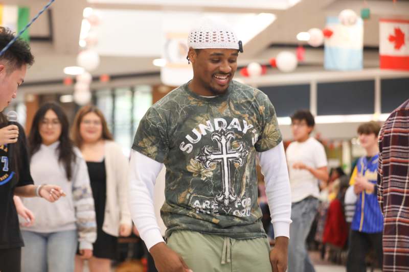 a man in a white hat