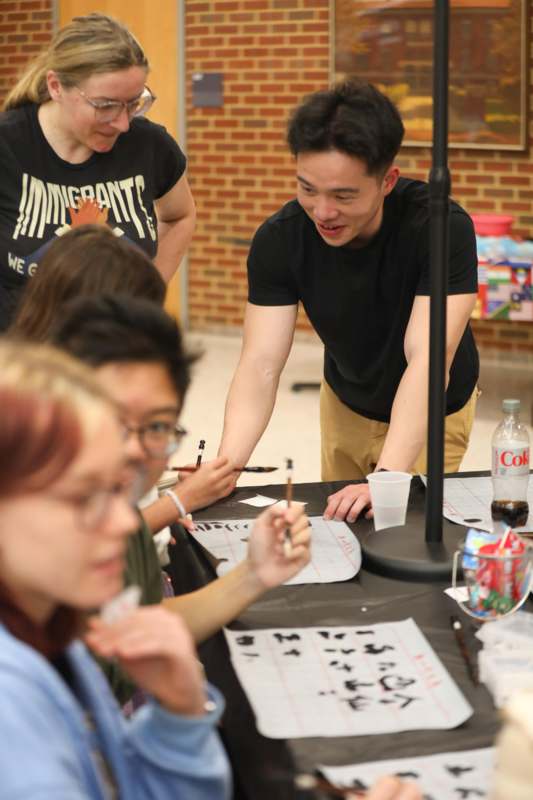a group of people around a table