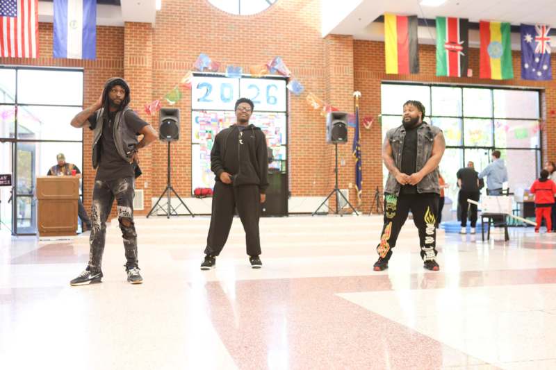 a group of men standing in a room