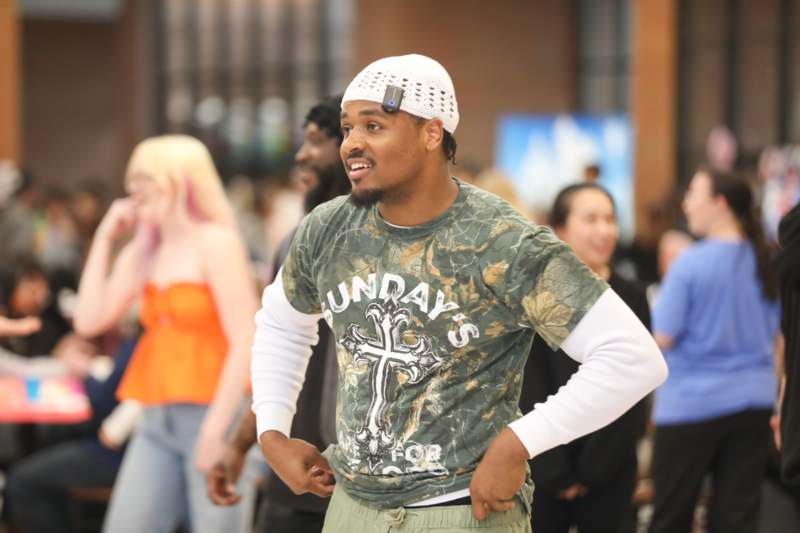 a man in a white hat