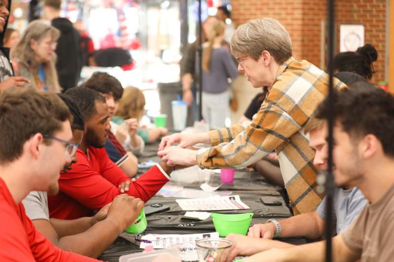 a group of people sitting at a table