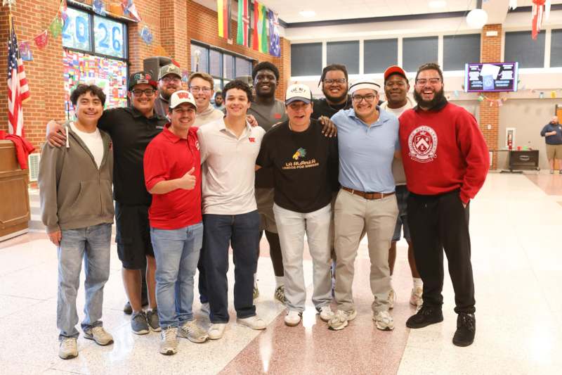 a group of people posing for a photo