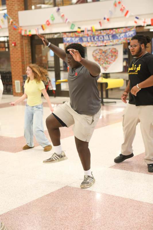 a group of people in a gym