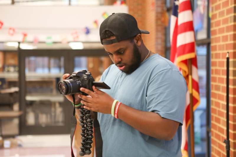 a man holding a camera