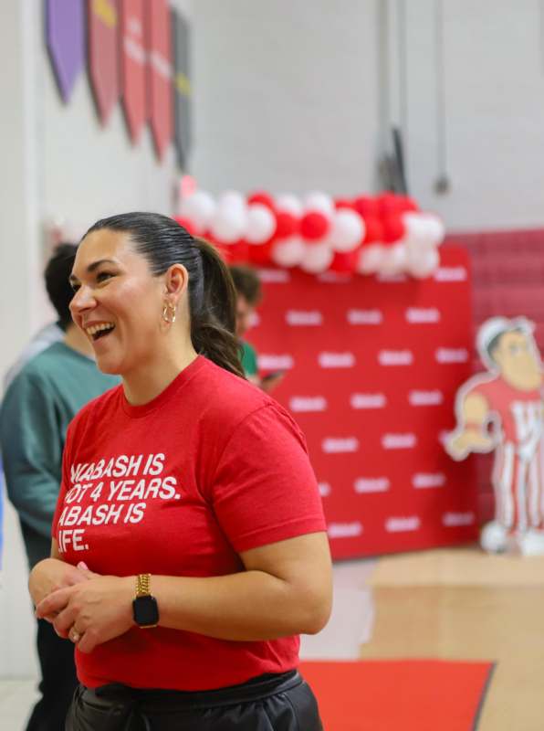 a woman in a red shirt