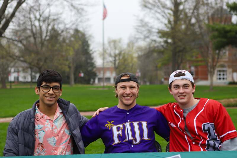 a group of men posing for a picture
