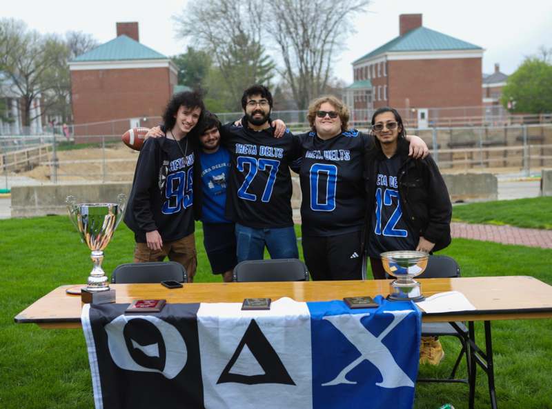 a group of people posing for a photo