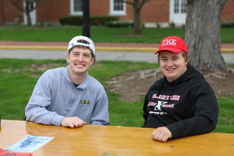 two men sitting at a table