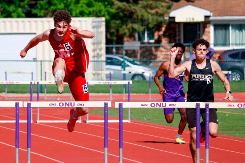 a group of people running on a track
