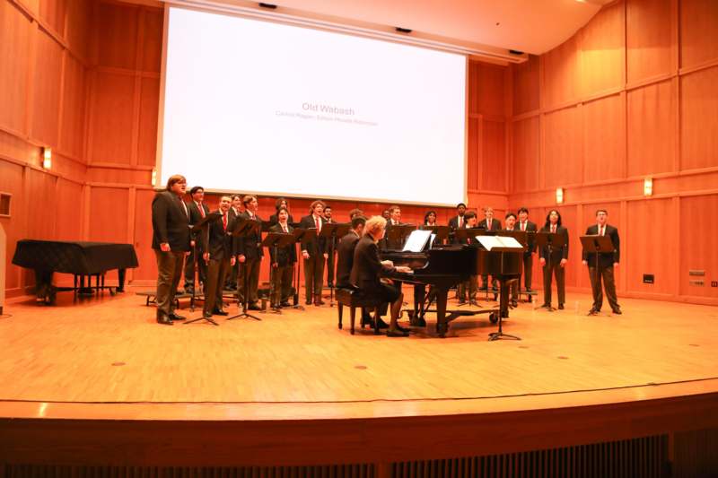 a group of people performing on a stage