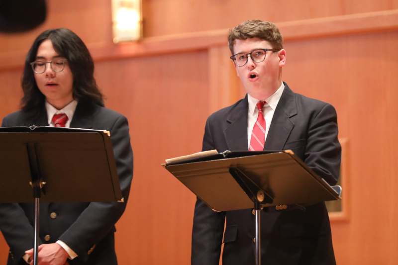 a group of people standing at a podium
