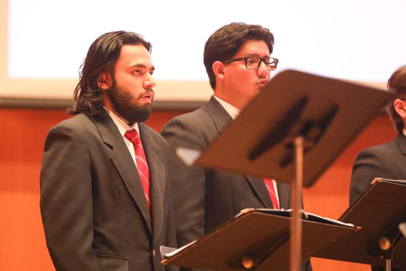 a group of men standing at a podium