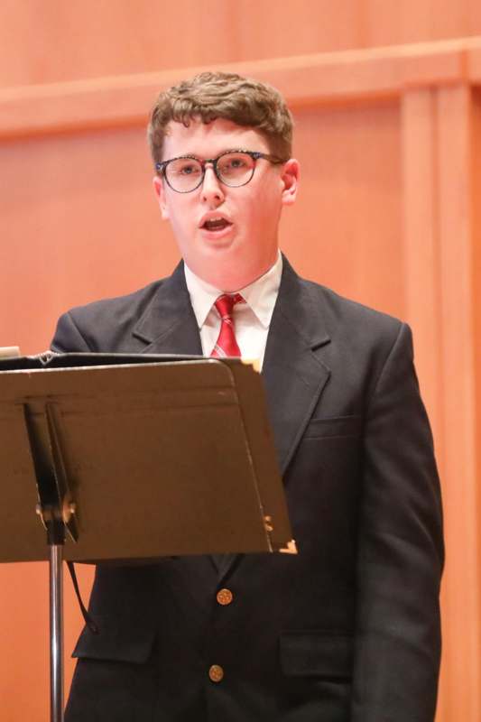 a man standing at a podium