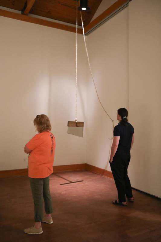 a woman looking at a object