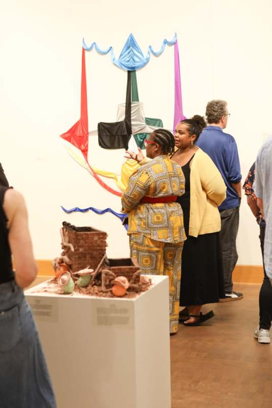 a group of people standing in a room