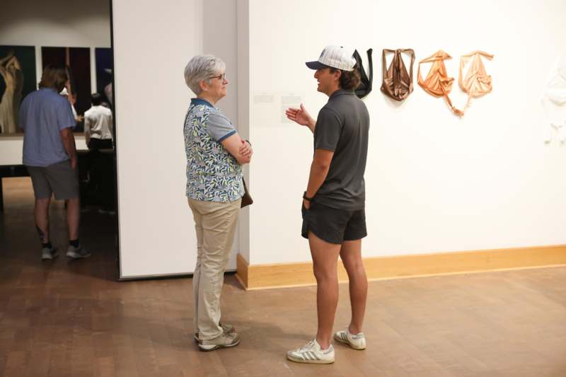 a man and woman standing in a room