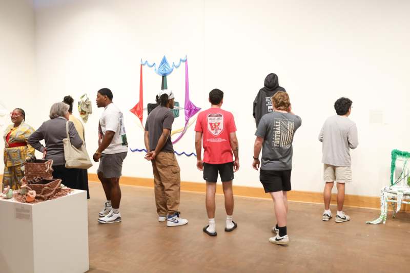 a group of people standing in a room