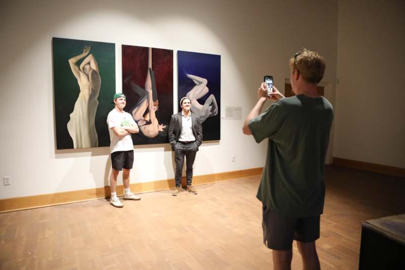 a man taking a picture of a group of people