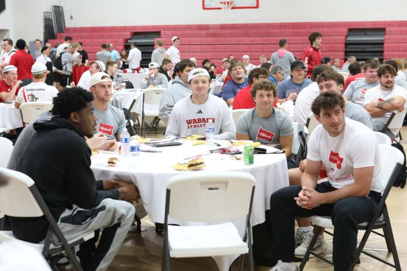 a group of people sitting around a table
