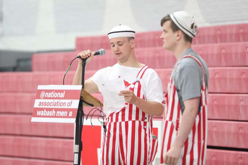 Day of Giving 04.29.2026 - a man in striped overalls speaking into a microphone