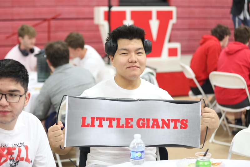 a man holding a sign