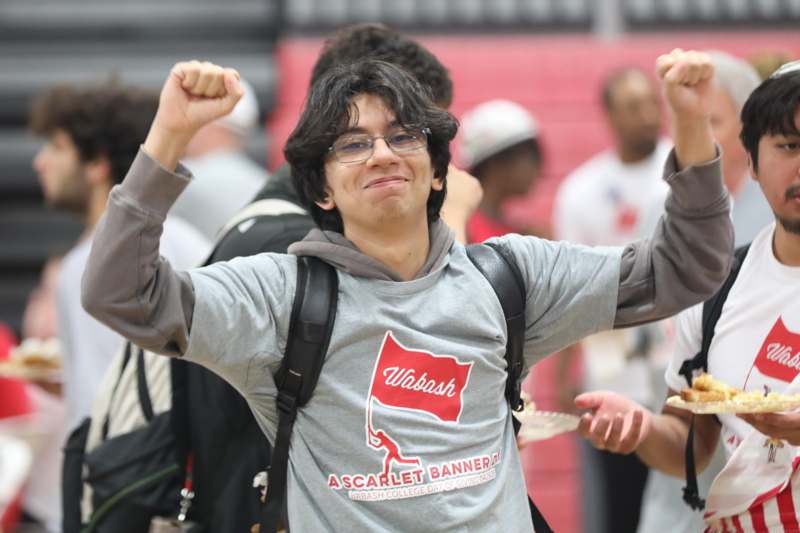 a man with his arms up