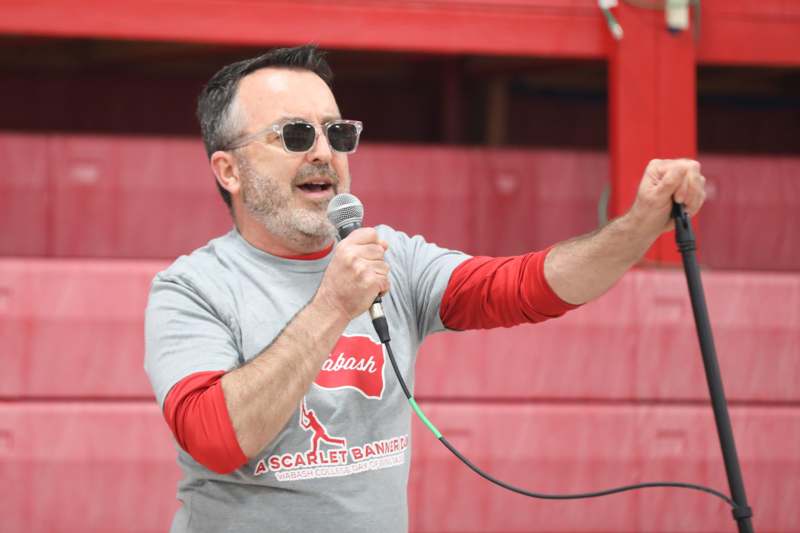 a man holding a microphone