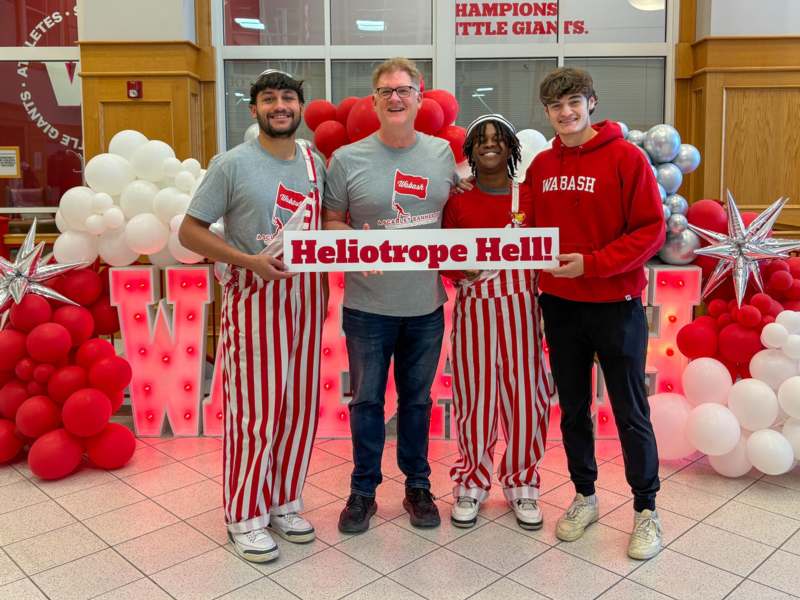 a group of people posing for a photo