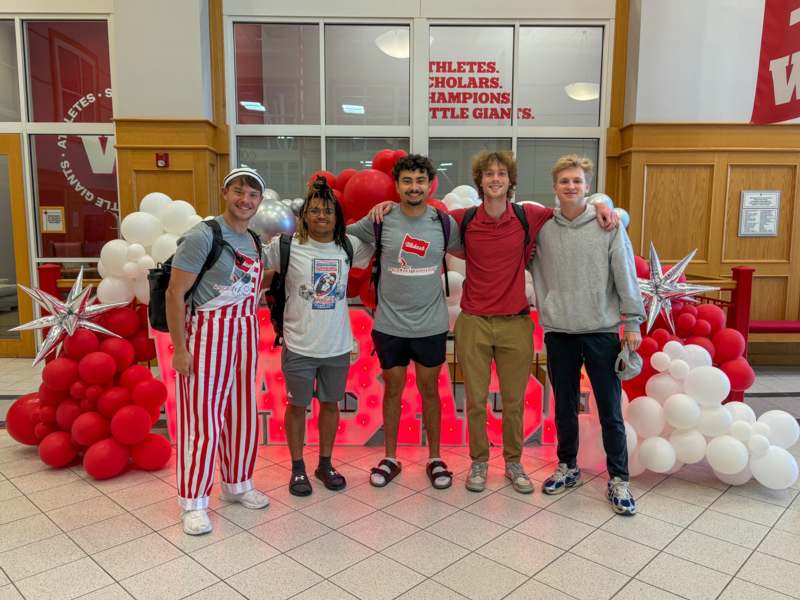 a group of people posing for a photo