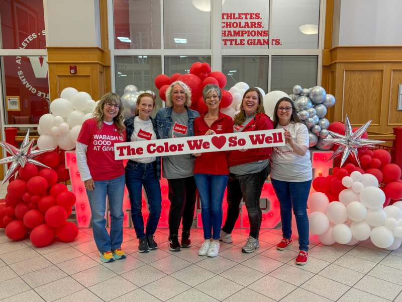 a group of people posing for a photo