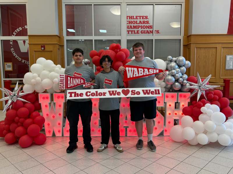 a group of people posing for a photo