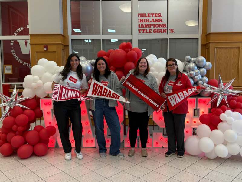 a group of women posing for a photo