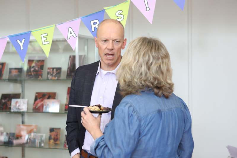a man holding a plate of food