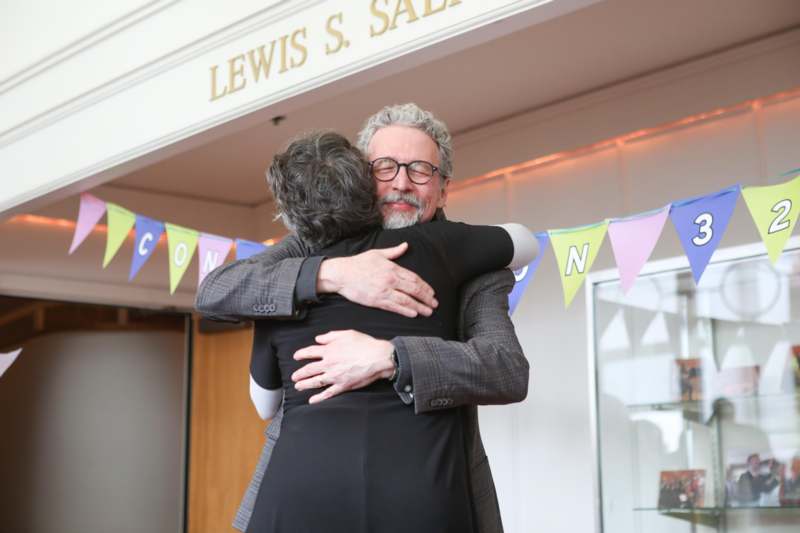 a man and woman hugging