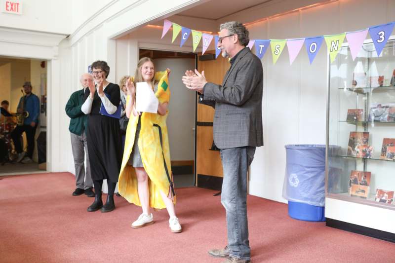a man and woman clapping