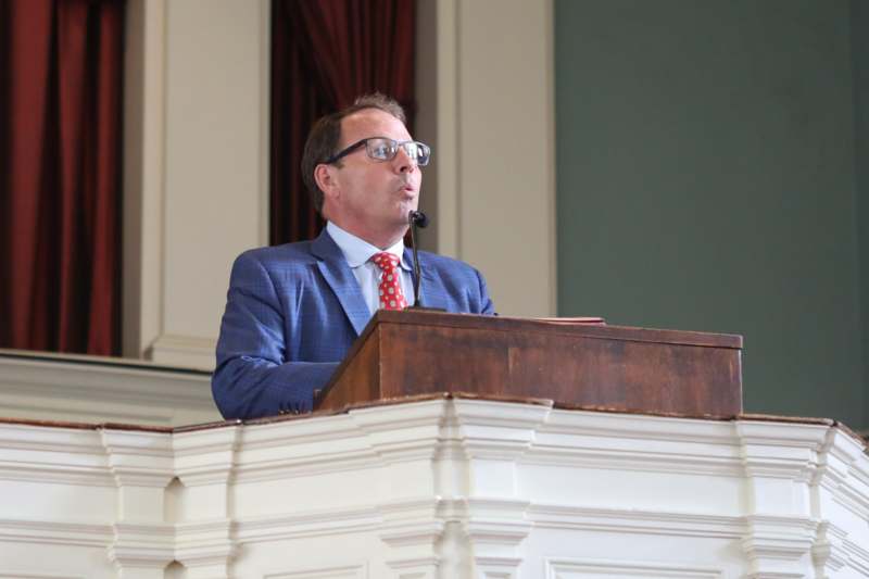 a man speaking into a microphone