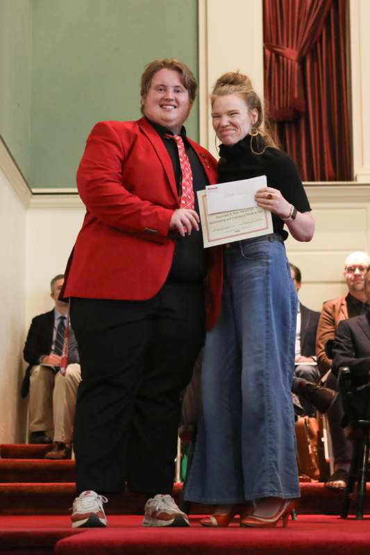 a man and woman posing for a picture