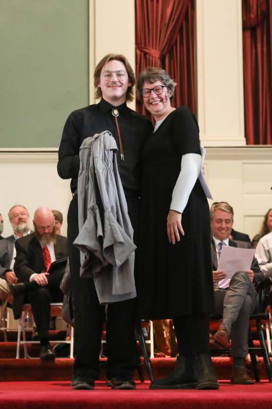 a man and woman standing together
