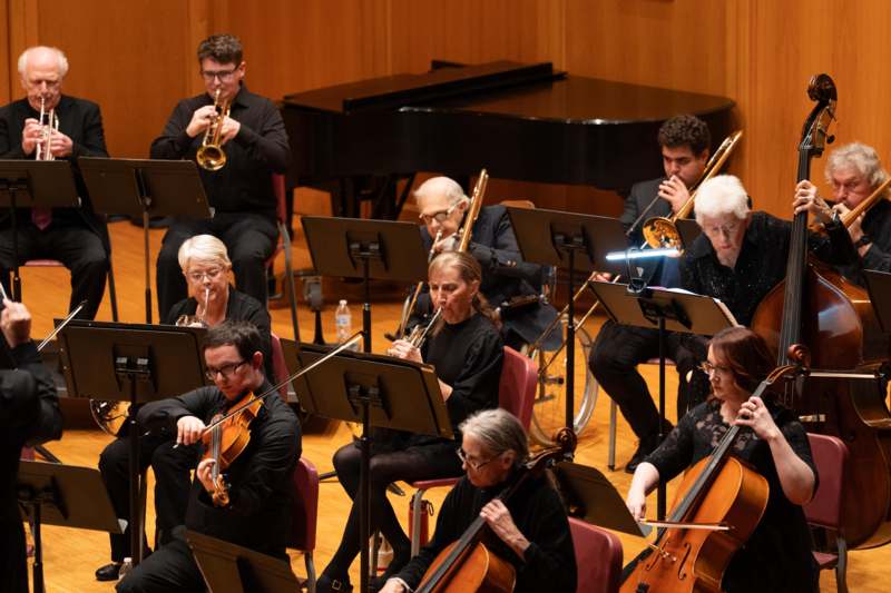 a group of people playing instruments