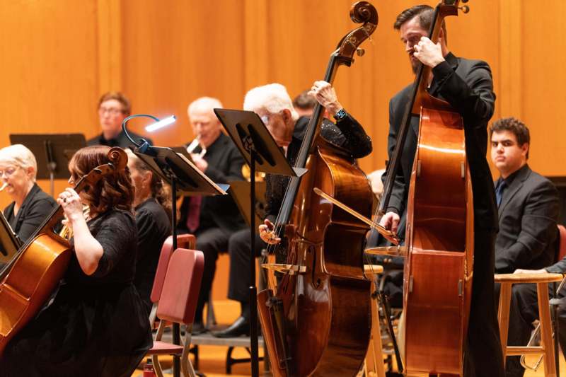 a group of people playing instruments