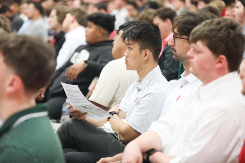 a group of people sitting in a room