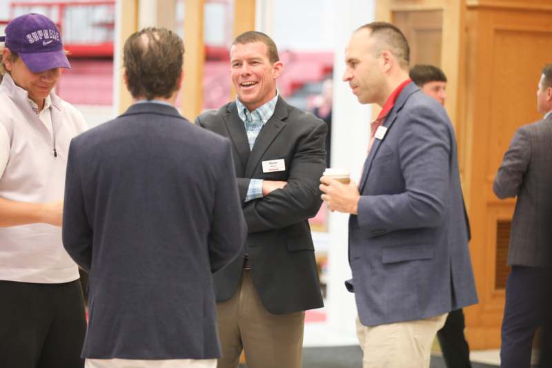 a group of men talking
