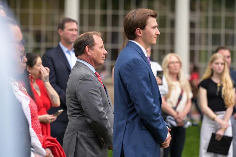 a group of people standing in a line