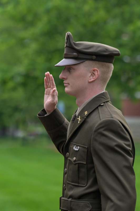 a man in a uniform saluting