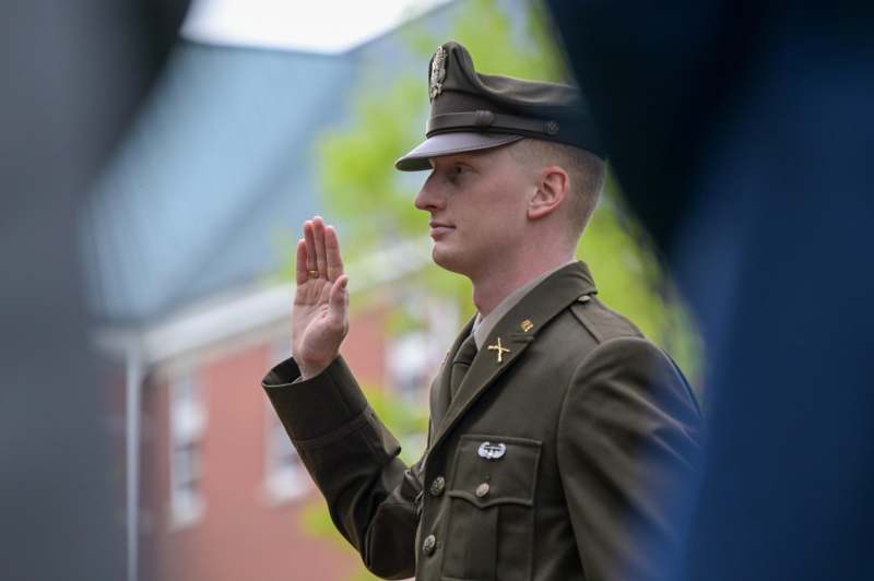 a man in a uniform saluting