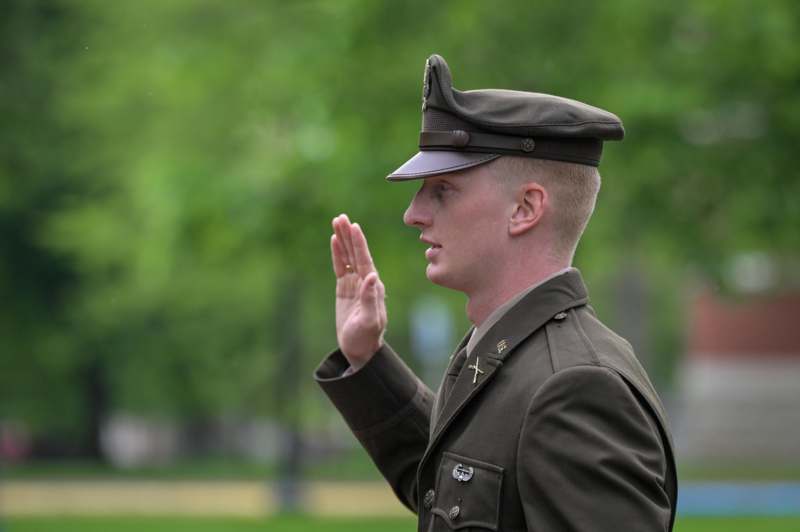 a man in a uniform saluting