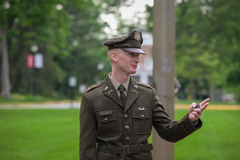 a man in a uniform holding a gun